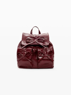Mały błyszczący plecak z kokardą Desigual