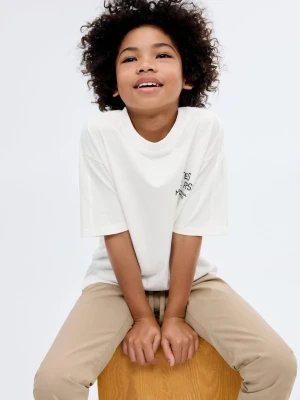 MANGO KIDS - Bawełniany wzorzysty t-shirt złamana biel - lata - Dzieci