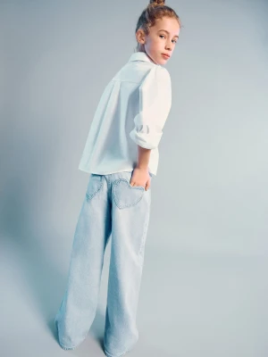 Jeansy wide leg z kieszeniami w kształcie serca jasnoniebieski - Dzieci - lata - MANGO KIDS