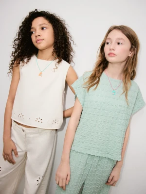 Teksturowana koszulka z kokardami bladozielony - Dzieci - lata - MANGO KIDS