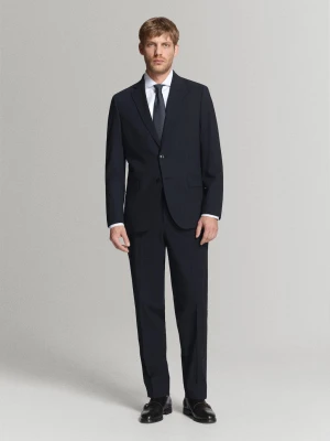 Spodnie garniturowe London regular fit granatowy - Mężczyzna - - MANGO MAN