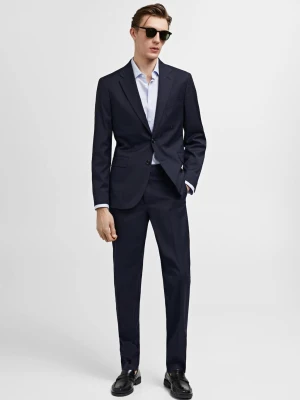 MANGO MAN - Spodnie od garnituru slim fit z tkaniny comfort stretch ciemnogranatowy - - Mężczyzna