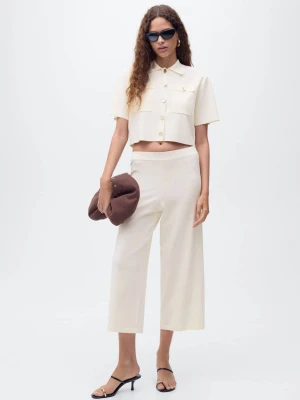 MANGO - Spodnie crop z dzianiny granatowy - - Kobieta