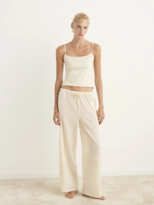 MANGO - Spodnie piżamowe z bawełny z koronką i plisami waniliowy - - Kobieta