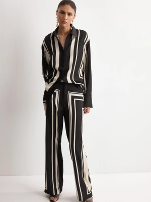 MANGO - Spodnie satynowe ze wzorem czarny - - Kobieta