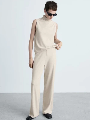 MANGO - Spodnie wide leg z cienkiej dzianiny beżowy - - Kobieta
