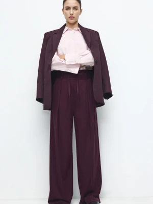 MANGO - Spodnie z zakładkami z łączoną talią kasztanowy - - Kobieta