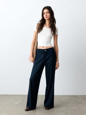 MANGO TEEN - Spodnie lniane wiązane z przodu granatowy - - Dziewczyna