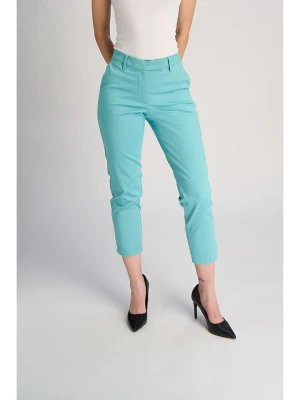 Marks & Spencer Spodnie chino w kolorze turkusowym rozmiar: 44