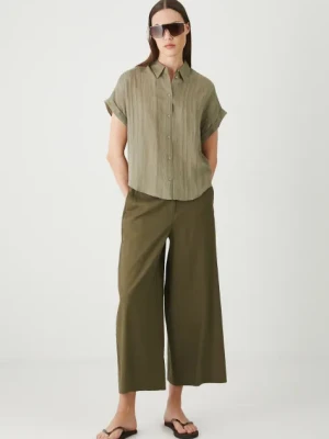 Medicine spodnie lniane kolor zielony fason culottes medium waist
