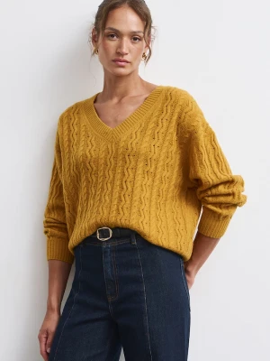 Medicine sweter damski wełniany żółty