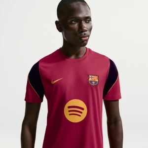 Męska koszulka piłkarska z krótkim rękawem Nike Dri-FIT FC Barcelona Strike - Czerwony