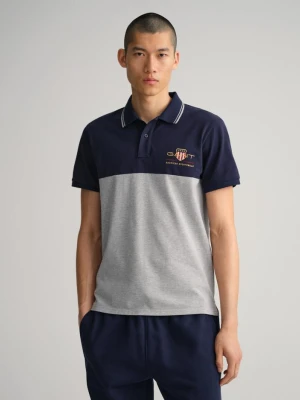 Męska koszulka polo z piki w bloki kolorystyczne z motywem tarczy GANT