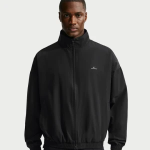 Męska kurtka koszykarska z tkaniny Dri-FIT Nike Standard Issue - Czerń