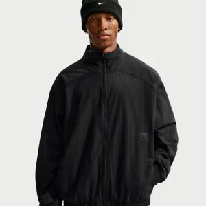 Męska kurtka Nike z tkaniny o kroju oversize z zamkiem na całej długości N.A.C. Dri-FIT - Czerń