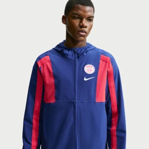 Męska kurtka piłkarska z tkaniny Nike Paris Saint-Germain Energy - Niebieski