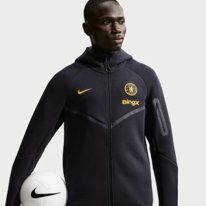 Męska piłkarska bluza z kapturem i zamkiem na całej długości Nike Chelsea F.C. Tech Fleece Windrunner - Niebieski