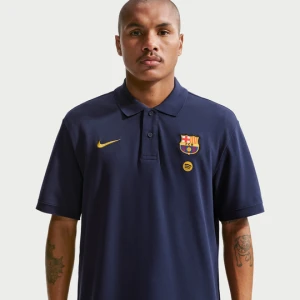 Męska piłkarska koszulka polo Nike FC Barcelona Club - Niebieski