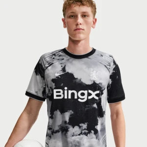Męska przedmeczowa koszulka piłkarska Nike Dri-FIT Chelsea F.C. - Szary