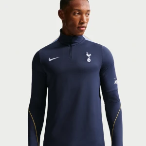 Męska treningowa koszulka piłkarska z dzianiny Nike Dri-FIT Tottenham Hotspur Strike - Niebieski