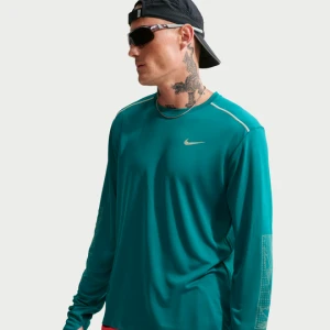 Męska zimowa koszulka z długim rękawem i ochroną przed promieniowaniem UV do biegania Dri-FIT Nike Miler - Niebieski