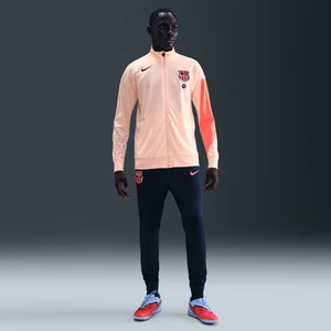 Męski dres piłkarski z dzianiny Nike Dri-FIT Total 90 FC Barcelona Strike (wersja trzecia) - Pomarańczowy