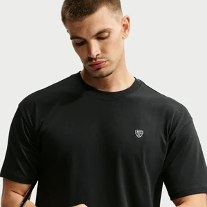 Męski T-shirt do golfa o luźnym kroju Nike Dri-FIT - Czerń