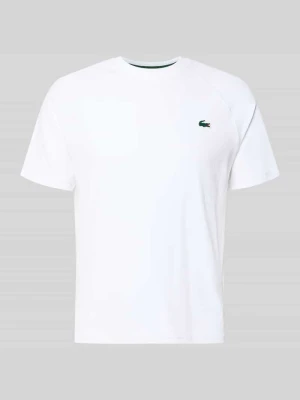 męski t-shirt o kroju regular fit do sportu z detal z logo Lacoste Biały