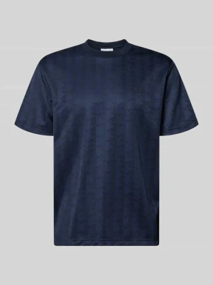 męski t-shirt o kroju regular fit z nadrukiem w monogramy Lacoste Ciemnoniebieski