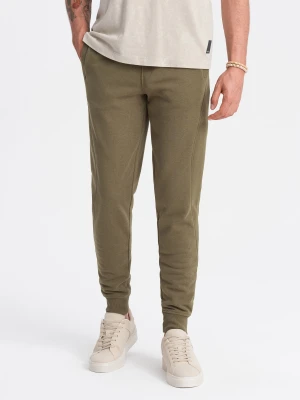Męskie bawełniane spodnie dresowe joggery BASIC – oliwkowe V2 - Rozmiar: S Ombre Clothing