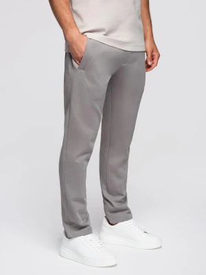 Zdjęcie produktu Męskie dresowe spodnie z nogawką bez ściągacza - szare V8 - Rozmiar: L Ombre Clothing