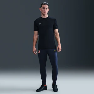 Męskie dzianinowe spodnie piłkarskie Nike Dri-FIT Atlético Madryt Strike - Niebieski