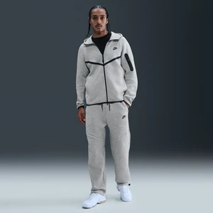 Męskie dzianinowe spodnie z luźnymi nogawkami Nike Tech - Szary