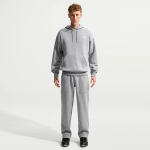 Męskie dzianinowe spodnie z nogawkami bez ściągaczy Nike - Szary
