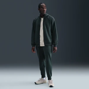 Męskie funkcjonalne joggery z ochroną przed promieniowaniem UV Dri-FIT Nike Primary Fleece - Zieleń