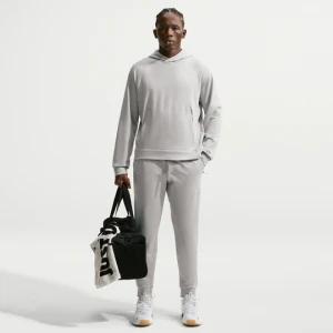 Męskie funkcjonalne joggery z ochroną przed promieniowaniem UV Nike Primary NanoKnit Dri-FIT - Brązowy