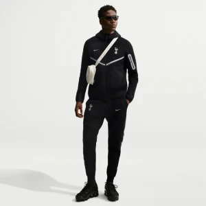 Męskie joggery piłkarskie Nike Tottenham Hotspur Tech Fleece - Czerń