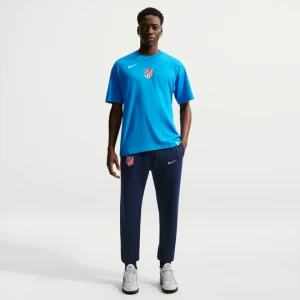 Męskie joggery piłkarskie z dzianiny dresowej Nike Football Atlético Madryt Club - Niebieski