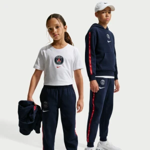 Męskie joggery piłkarskie z dzianiny Nike Paris Saint-Germain Home City Side - Niebieski