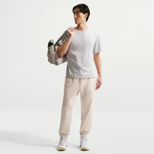 Męskie joggery Therma-FIT Nike Primary NanoKnit - Brązowy