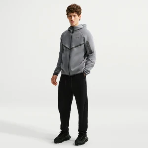 Męskie luźne spodnie z dzianiny Nike Tech - Czerń