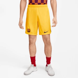 Męskie spodenki piłkarskie Nike Dri-FIT FC Barcelona Stadium 2023/24 (wersja czwarta) - Żółty