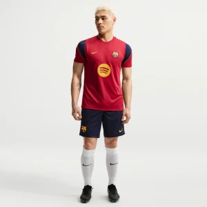 Męskie spodenki piłkarskie z dzianiny Nike Dri-FIT FC Barcelona Strike - Niebieski