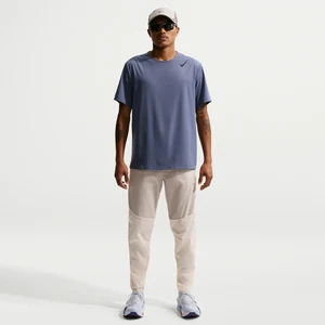 Męskie spodnie do biegania z tkaniny Repel Nike Stride - Brązowy