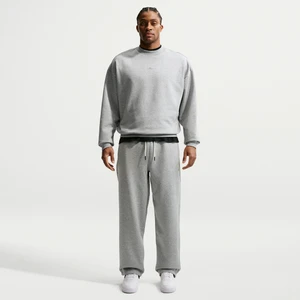 Męskie spodnie do koszykówki ze szczotkowanej dzianiny z luźnymi nogawkami Therma-FIT Nike Standard Issue - Szary