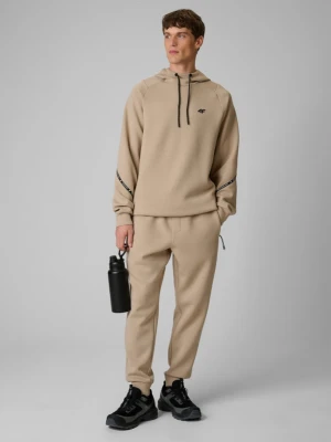 Męskie spodnie dresowe joggery 4F 4FWSS26TTROM1443 - beżowe
