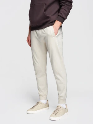 Męskie spodnie dresowe ze ściągaczem przy nogawce BASIC jogger - kremowe V11 - Rozmiar: XL Ombre Clothing kremowy