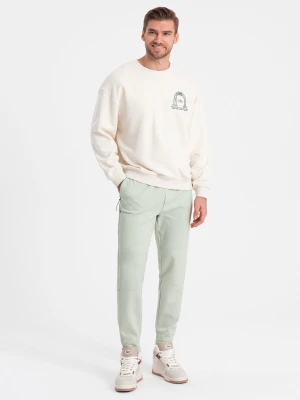 Męskie spodnie joggery dresowe na gumce z przeszyciami – miętowe V3 - Rozmiar: XL Ombre Clothing