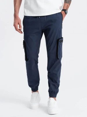 Męskie spodnie JOGGERY z zapinanymi kieszeniami cargo - granatowe V5 - Rozmiar: S Ombre Clothing