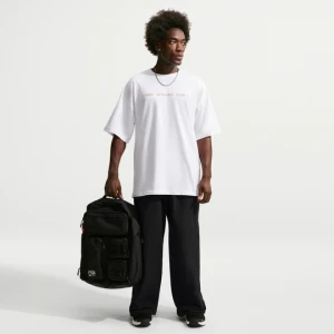 Męskie spodnie Nike z tkaniny o kroju oversize N.A.C. Dri-FIT - Czerń